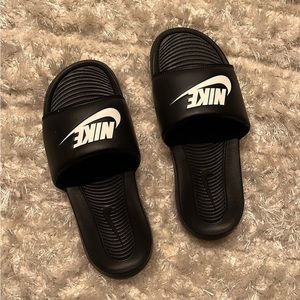 Black Nike slippers